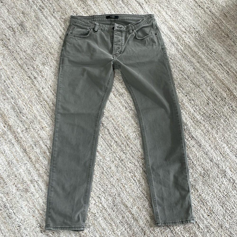 Neuw green denim.  No flaws. Soft and comfortable